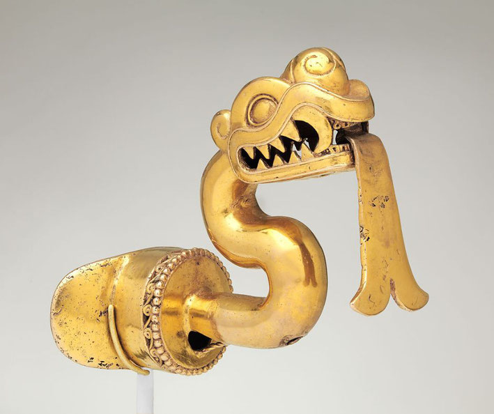 A gold serpent labret with an articulated tongue, likely an ancient Mesoamerican ornament worn through a lip piercing, symbolizing power, transformation, or divine connection.