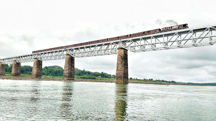  Metre Gauge train passing over the Narmada river near Omkareshwar Road railway station.