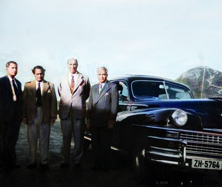 The some of the men Mandali pose in Switzerland next to the 1947 Chrysler motor vehicle which transported Meher Baba & his women Mandali. ( L-R ) Meherjee Karkaria, Dr. Nilu Godse, Sarosh K. Irani & Adi K. Irani. Image colourized by Anthony Zois.