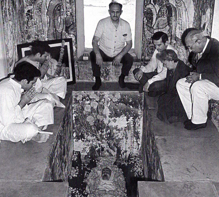 Start of February 1969. Don is seated  ( centre-right ) near the window sill, inside Meher Baba's crypt.