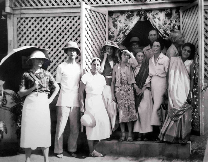 1938 : Nasik, India. Kitty standing in the middle holding a hat.