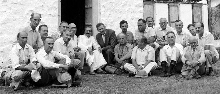 1954 : Darwin is on the far right of Meher Baba at his tomb at Upper Meherabad, India. LM p. 4438