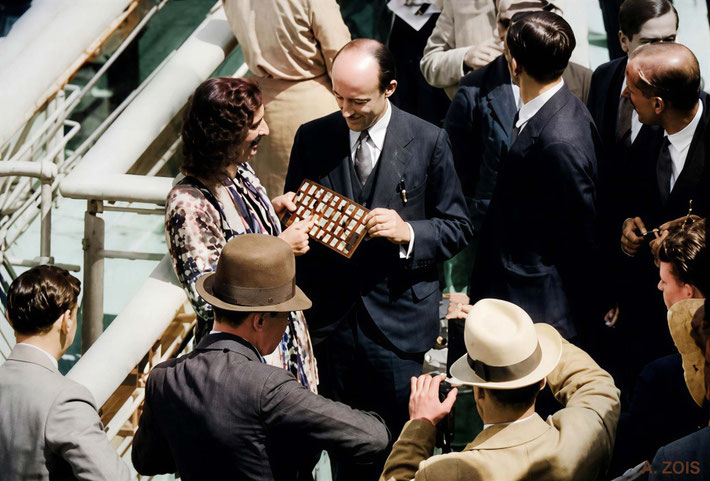 1932 : Meher Baba on board the SS Bremen in New York harbour with Meredith Starr and reporters. Image rendition by Anthony Zois. BP