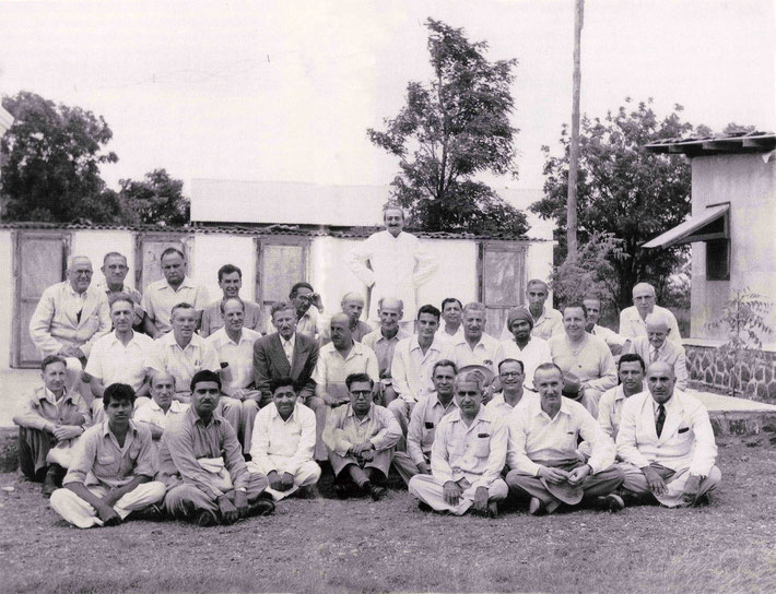 1954 - Upper Meherabad, India. Meher Baba with both his Eastern & Western followers. Krishan is seated on the top row, 3rd far right. LM p.4500