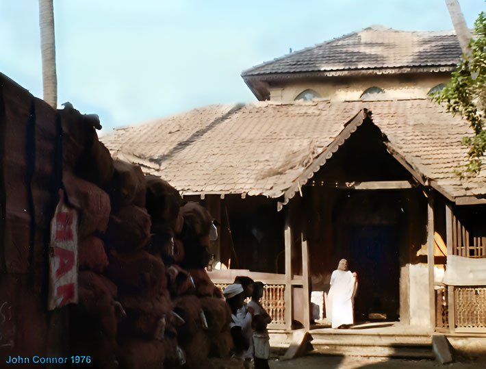 1976 : Khorshed Irani on the entrace steps of the Manzil-e-Meem. Photo courtesy of John Connor.