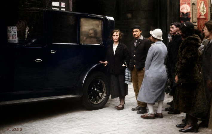 1932 : Meher Baba seated inside a car to take him back to London. Margaret & Meredith Starr and other guest are in the garage at Combe Martin, Devon, UK. Image rendition by Anthony Zois. BP