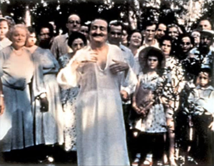 Elizabeth is standing next to Beryl Williams at the Center.