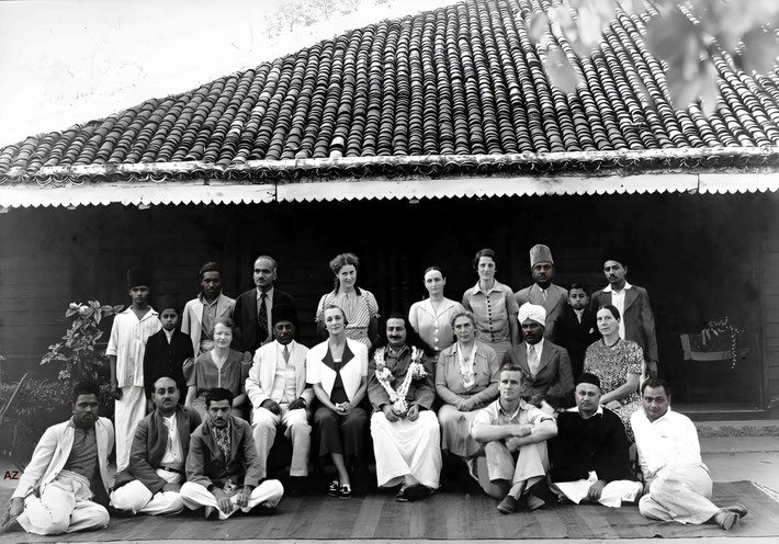 Mid-1930s : Meher Baba with both his Eastern & Western followers. Image enhanced by Anthony Zois.