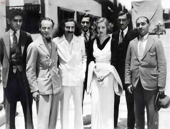  Mid-1932 - Hollywood, California. Meher Baba posing with Tallulah Bankhead and his followers. Image enhanced by Anthony Zois.