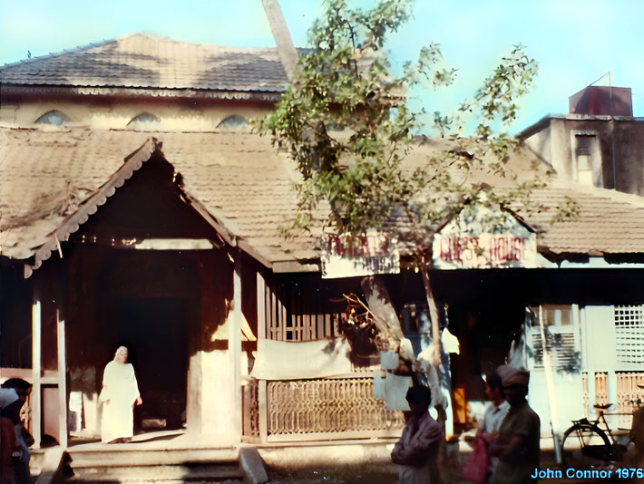 1976 : Khorshed Irani on the entrace steps of the Manzil-e-Meem. Photo courtesy of John Connor.