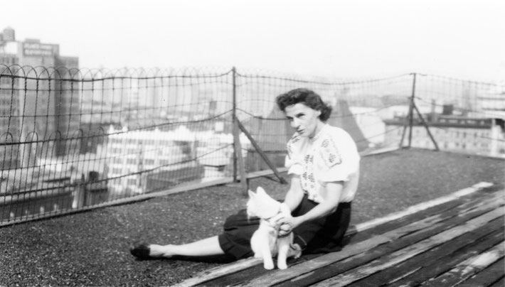 Ella and cat on New York rooftop. Courtesy of Meher Archives