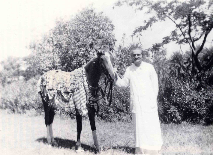 Meher Baba with Sheba in Satara in 1956. Image is courtesy of Lord Meher.
