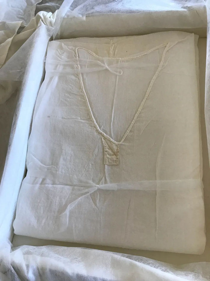 A SADRA worn by Avatar Meher Baba in the 1950s, given to Meher Mount in 2021, photo by Ellen Kwiatkowski