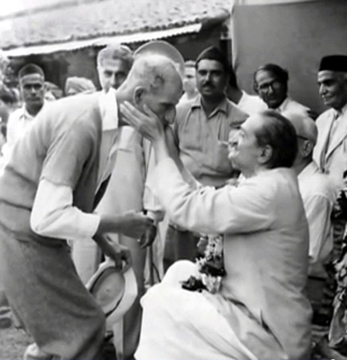 September 1954 :  Kumar is standing far rear of Meher Baba caressing Fred Mark's face.