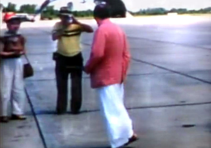 1956 : Joseph taking a photo of Baba arriving at Wilmington Airport, NC.