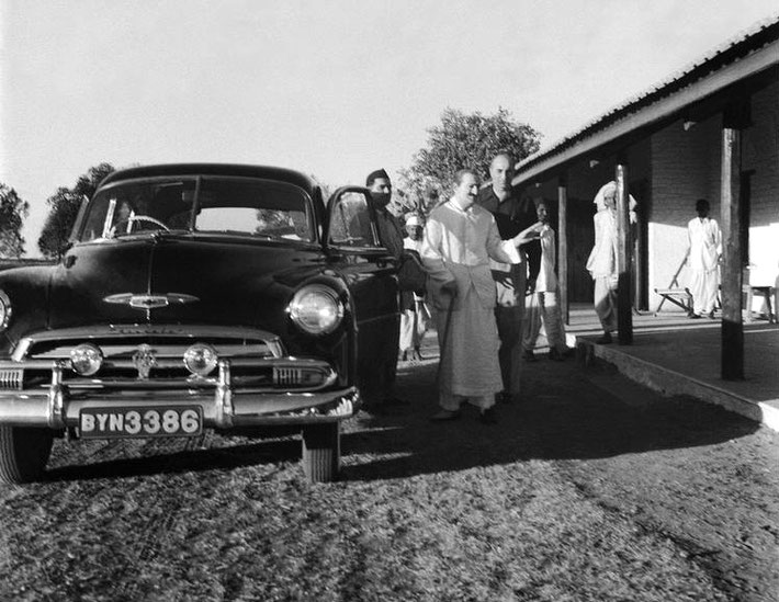 Meher Baba visiting Meherabad with Eruch Jessawala ( hat ) and Sarosh Irani