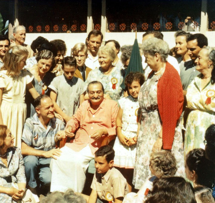 Baba with group including Charles at East West Gathering in Poona, India in 1962. Charles is behind Baba with fair hair. Courtesy of Charles Haynes.