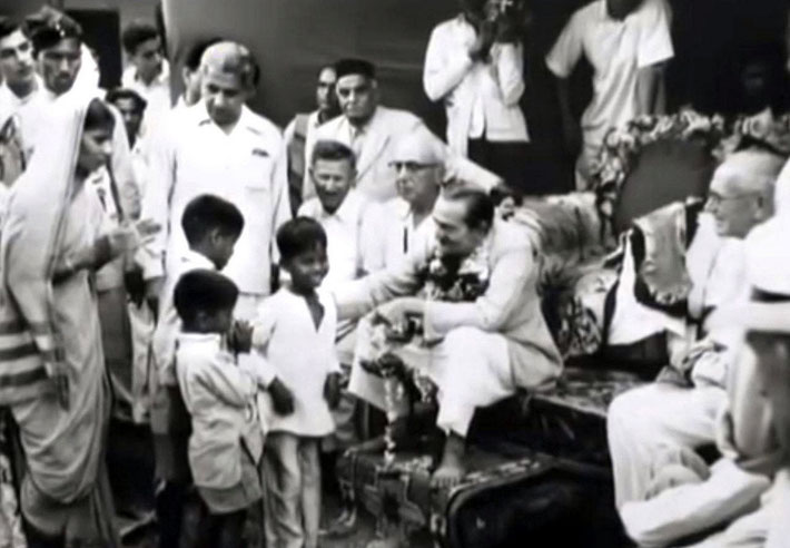 Frank is seated on the 2nd left of Meher Baba.