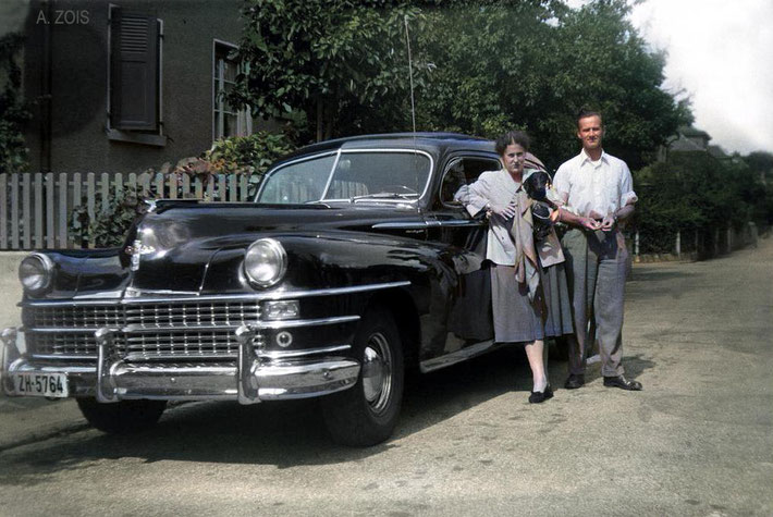 Irene Billo leaning on the Chrysler car she hired with Dr. Willian Donkin standing nearby. This is the car that Baba travelled throughout Switzerland. Image colourized by Anthony Zois.