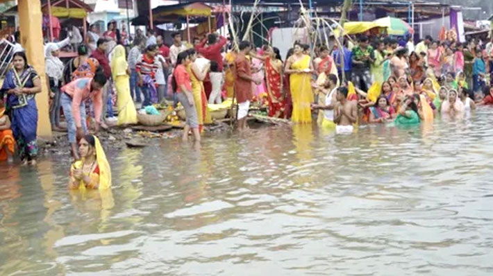 People bathing in the Namada River at Omkareshwar.