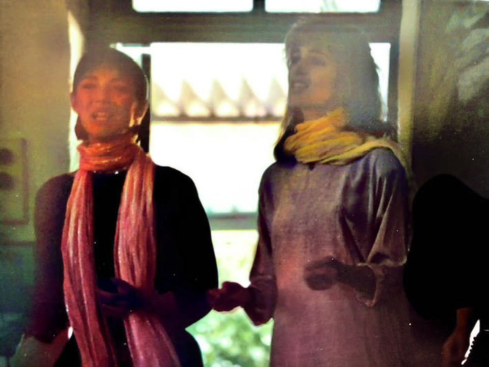 Debbie Nordeen and her sister Deanna singing in Mandali Hall, India - 1987
