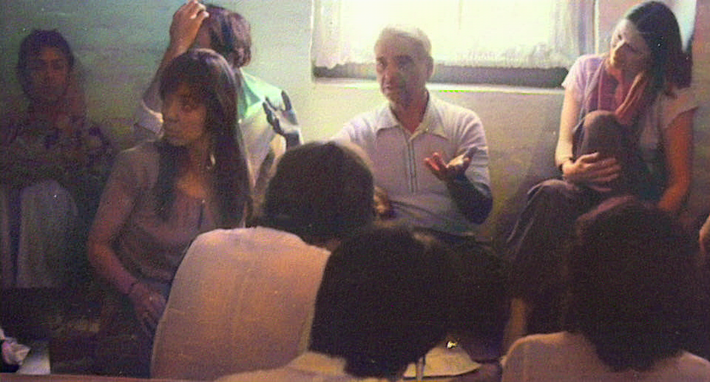 Ursula in Mandali Hall listening to Eruch Jessawala giving a talk.