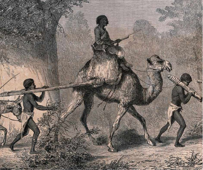 Enslaved people in Sudan carrying heavy loads while a man rides a camel, holding a whip.