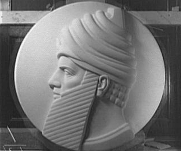 A profile relief of Hammurabi with a detailed beard and turban is carved into a round medallion at the U.S. Supreme Court.
