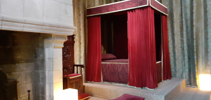 A reconstitution of the king's bedchamber, in the 1520, in Chambord Castle.  That's the king's bed.