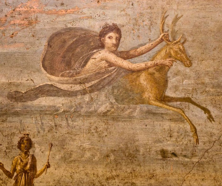 Ancient fresco of a woman riding a leaping stag, her cloak billowing behind her, with a smaller figure below holding a staff, possibly symbolizing divine or mythological imagery.