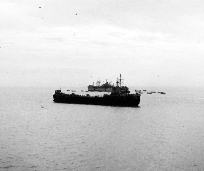 An L.S.T. has trouble with their screw propellor. A C.P.O. from the U.S.S. Pickaway volunteered to repair it, and did! These photos were taken during battle of Inchon.