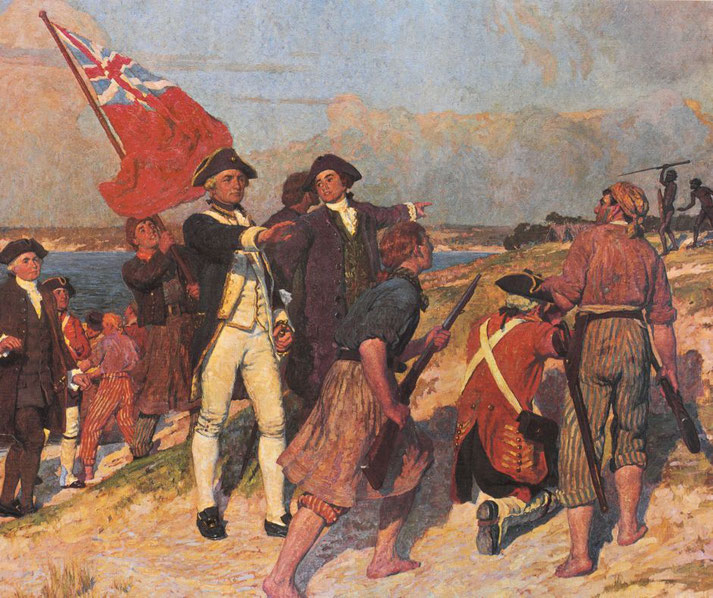 British colonial officers and soldiers confront Indigenous people on a shoreline, with one man holding a large red British flag and others gesturing forward.