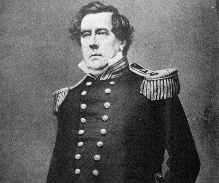 A black-and-white portrait of a stern-looking man in a military uniform with epaulets and a double-breasted coat.