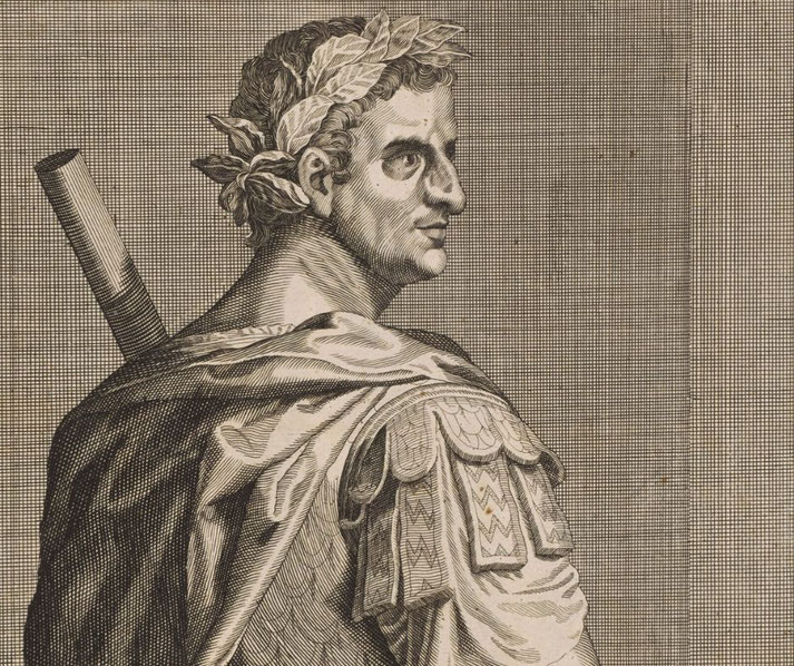 A Roman leader wearing a laurel wreath and military attire. He is depicted in profile with a serious expression, a draped cloak, and a fasces, symbolizing authority, on his shoulder.
