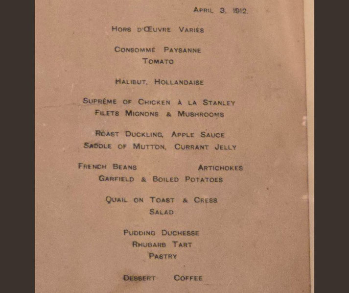 Titanic first-class dinner menu dated April 3, 1912, listing elegant dishes such as consommé, halibut, roast duckling, quail on toast, pudding duchesse, and coffee.