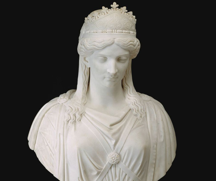 Marble bust of Zenobia by Harriet Hosmer, depicting the queen with downcast eyes and a crown, symbolizing dignity in captivity.