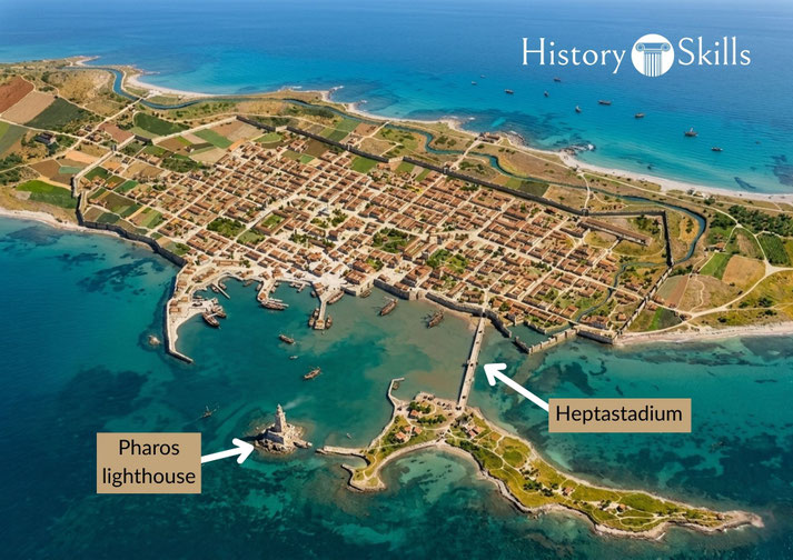Aerial reconstruction of ancient Alexandria, featuring the Pharos lighthouse, the Heptastadium causeway, harbours, city walls, and coastal waters.
