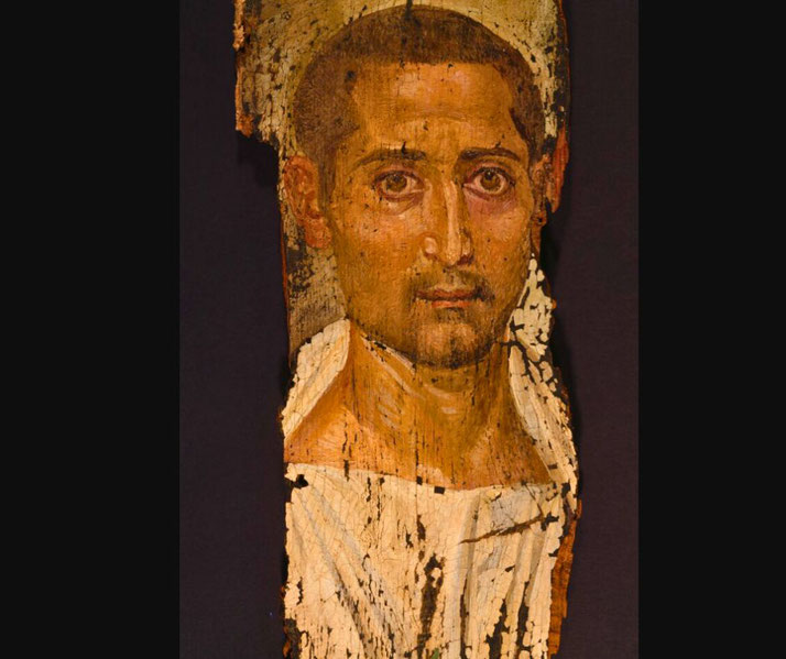 Encaustic portrait on cedar panel of a bearded man, used in Roman-Egyptian funerary practices.