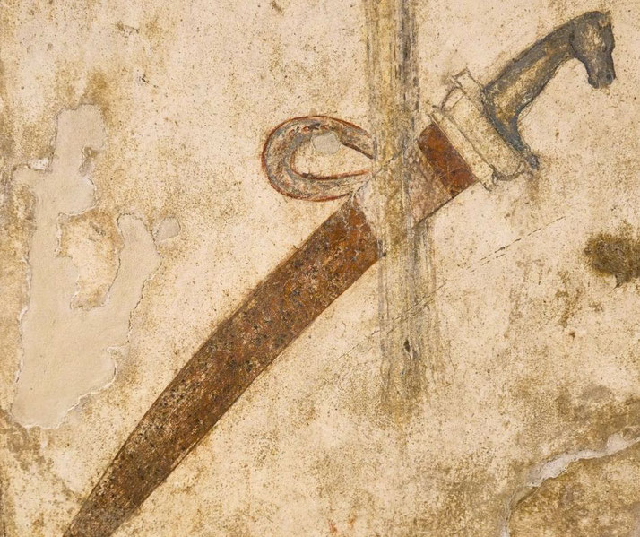 Ancient wall painting of a sheathed sword with a curved hilt, possibly used for ceremonial or symbolic purposes.