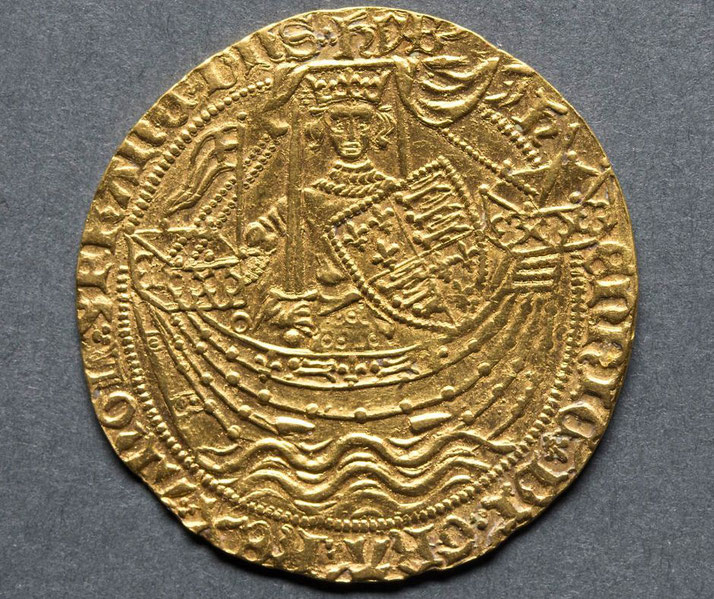 A medieval gold coin featuring a crowned ruler holding a shield with heraldic symbols, seated on a ship. 