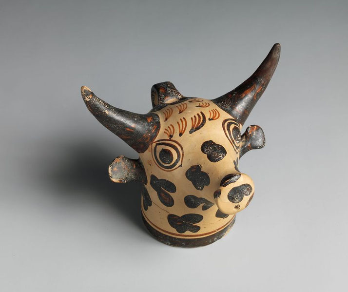 Minoan terracotta rhyton shaped as a bull's head, used for pouring libations through the muzzle opening.