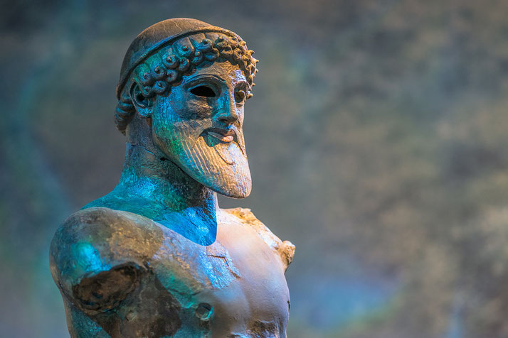 Statue of Poseidon with broken arms