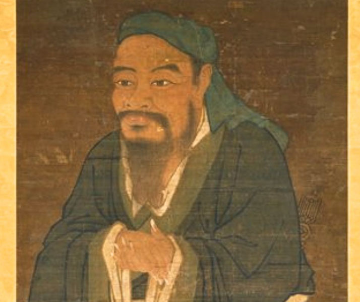 A traditional painting of Confucius, depicted with a beard, wearing a robe and head covering.