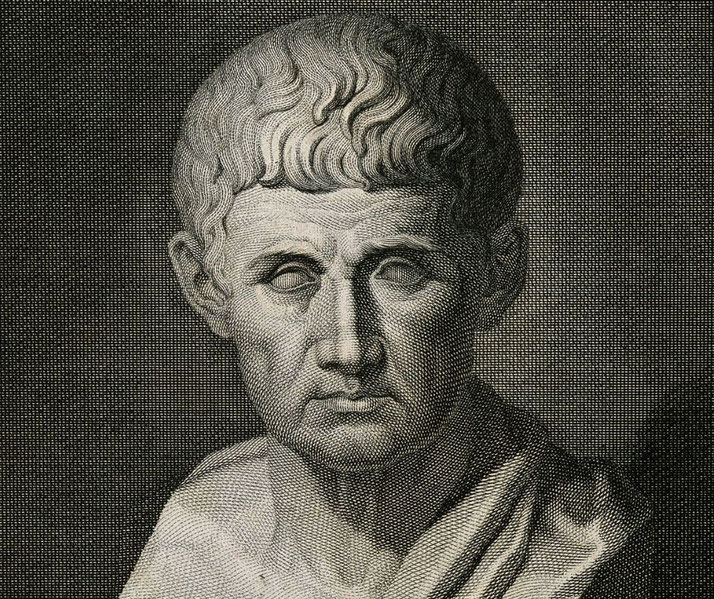 Engraved bust of a stern-faced man with short, wavy hair and blank eyes, wearing a draped garment.