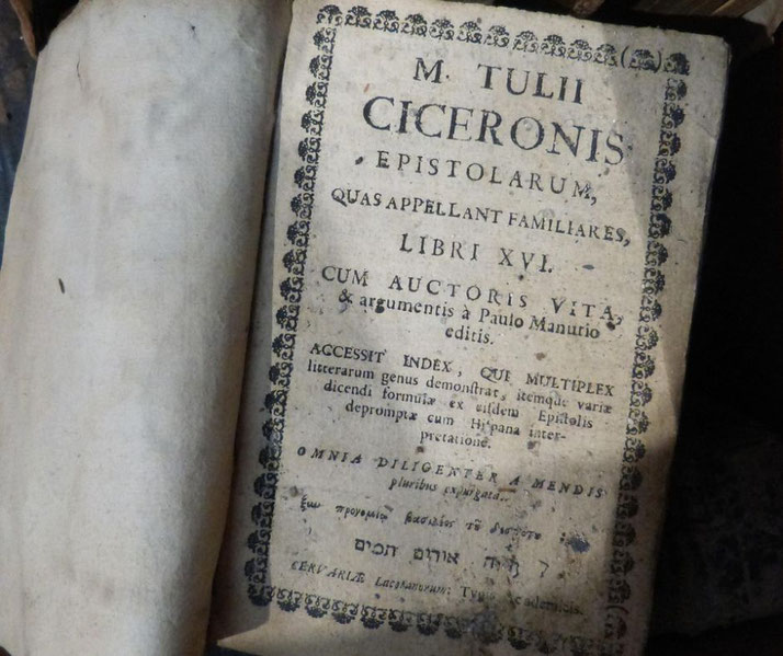 Old printed book showing the title page of Cicero’s Epistolarum, written in Latin with decorative borders and aged paper.