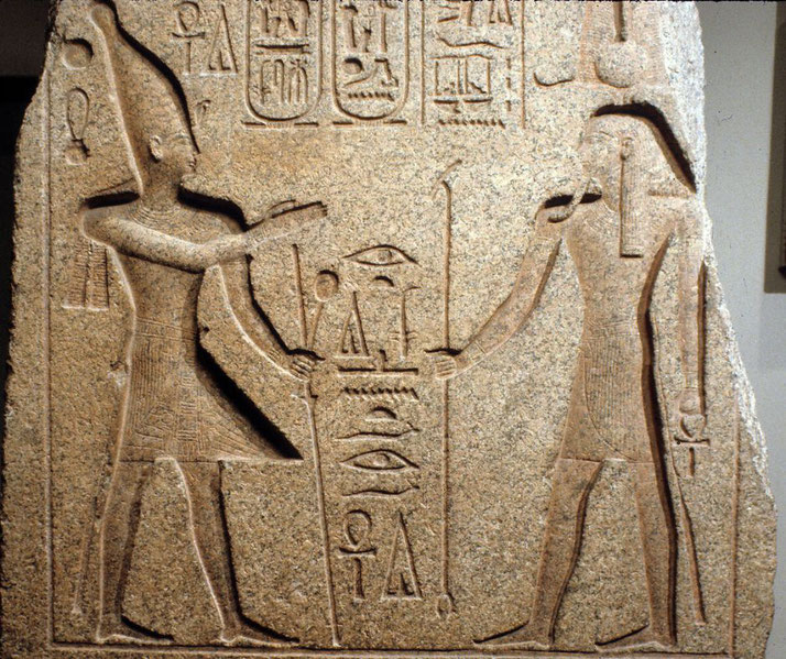 Granite doorjamb depicting Ramesses II offering to deities, later inscribed by Ramesses III.