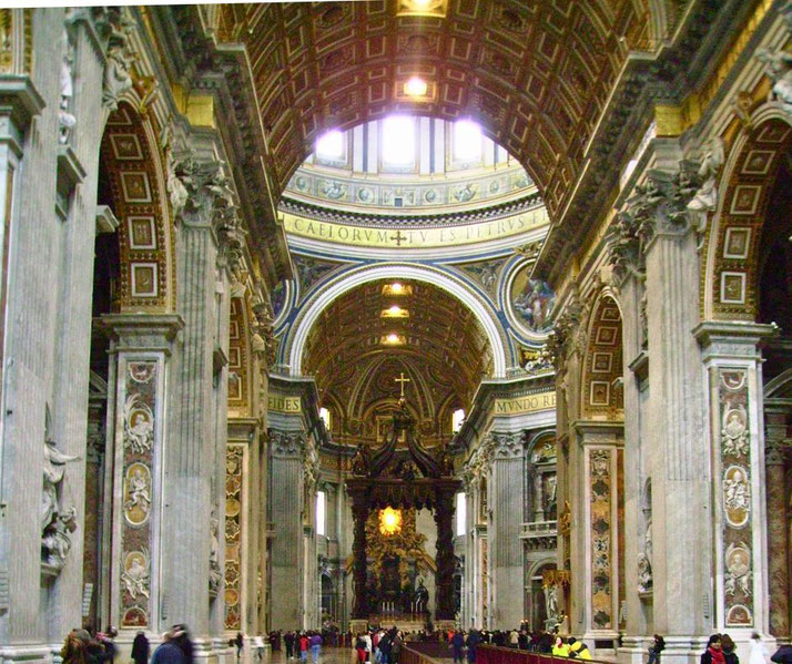 Interior of a grand basilica with high vaulted ceilings, massive columns, and a central altar beneath a sculpted canopy.