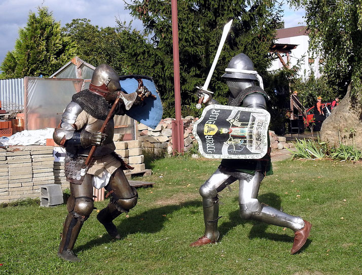 Knights fighting with axe and sword