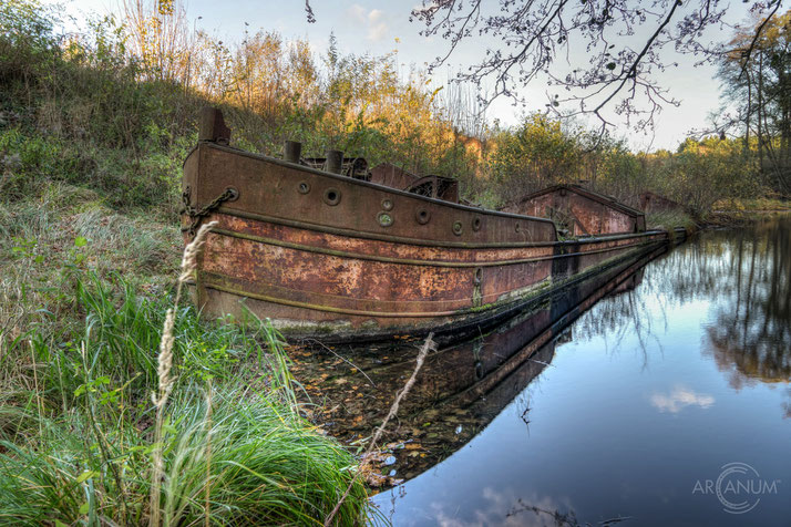 This rusty old barge is the only remaining remnant of a large former brick port