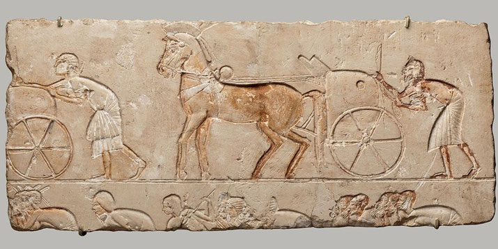 Limestone relief depicting chariots with grooms and attendants awaiting the royal family outside the Great Aten Temple